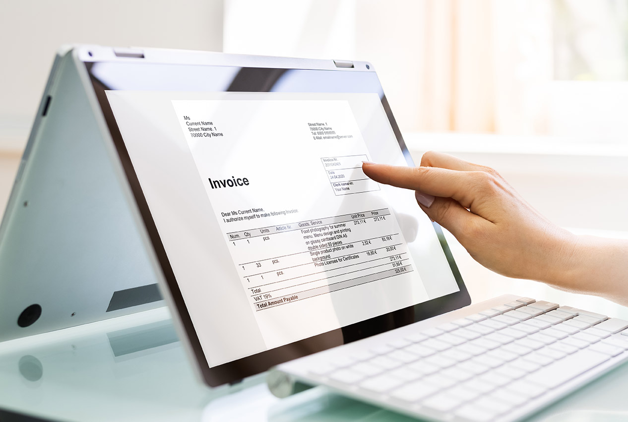 business invoice on computer